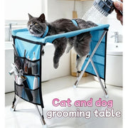 Foldable Pet Grooming Table for Cats and Small Dogs, Multi-functional Care Station with Mesh Bed, Storage Pockets, and Adjustable Restraint Straps for Nail Trimming, Hair Brushing, Bathing, and Ear Cleaning (Blue)